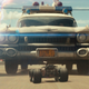 Ghostbuster: Afterlife's Ecto 1 vehicle from front on, driving in front of a radio controlled ghost trap